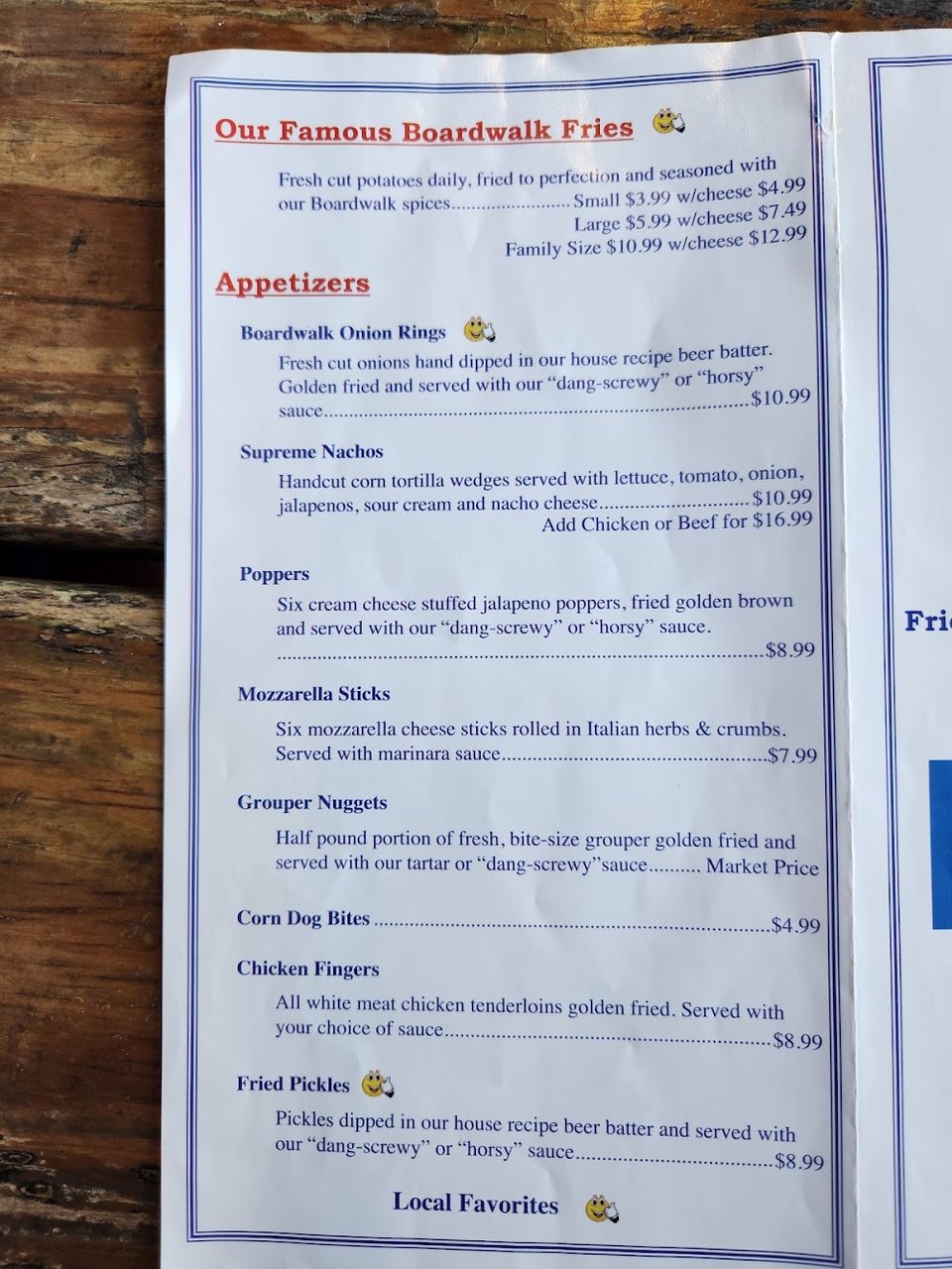 Printed menu with appetizers and comfort food.