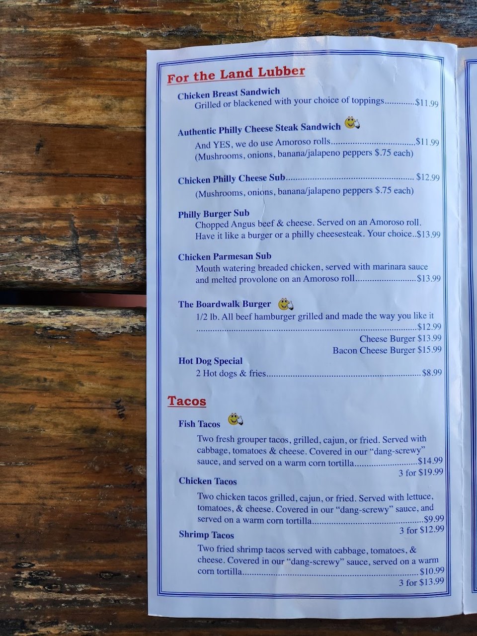 Restaurant menu beside a drink list.